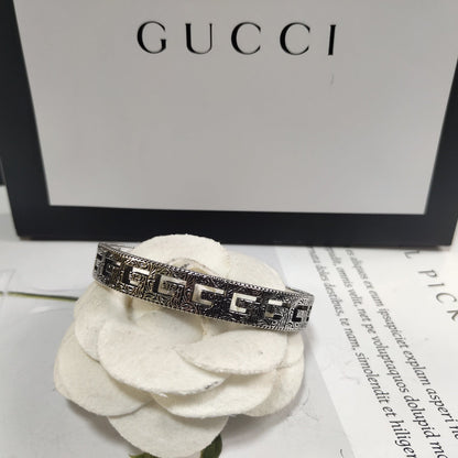 Boucles d'oreilles, collier, bracelet et bague Gucci vintage