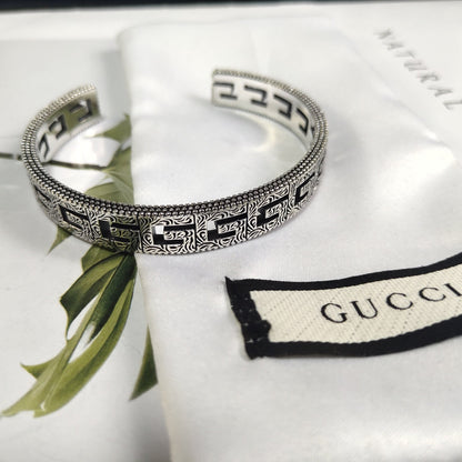 Boucles d'oreilles, collier, bracelet et bague Gucci vintage