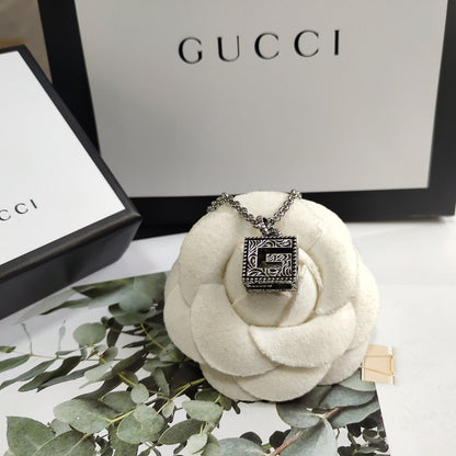 Boucles d'oreilles, collier, bracelet et bague Gucci vintage